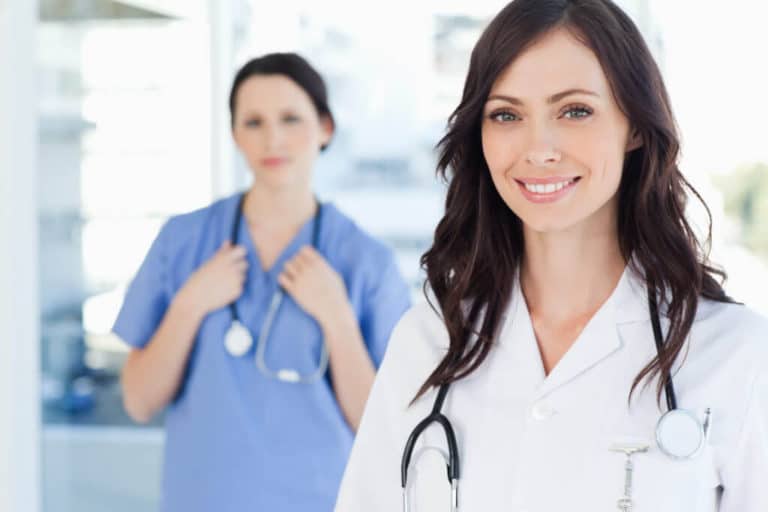 medical office cleaning services, two healthcare worker smiling