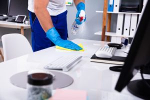 Manually cleaning and disinfecting the work space